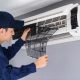 technician-service-removing-air-filter-air-conditioner-cleaning_35076-3617-640x426