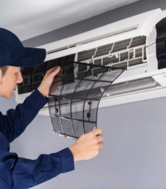 technician-service-removing-air-filter-air-conditioner-cleaning_35076-3617-640x426